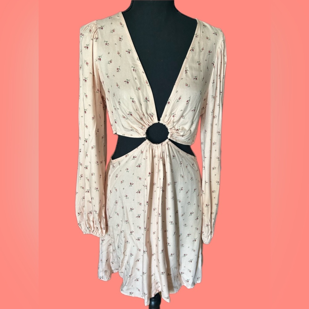 Summer pink dress with flowers.